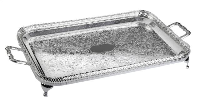 A rectangular silver plated metal tray with handles and legs.