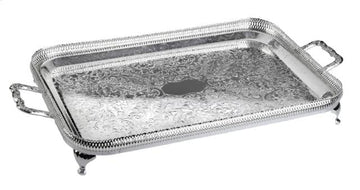 A rectangular silver plated metal tray with handles and legs.