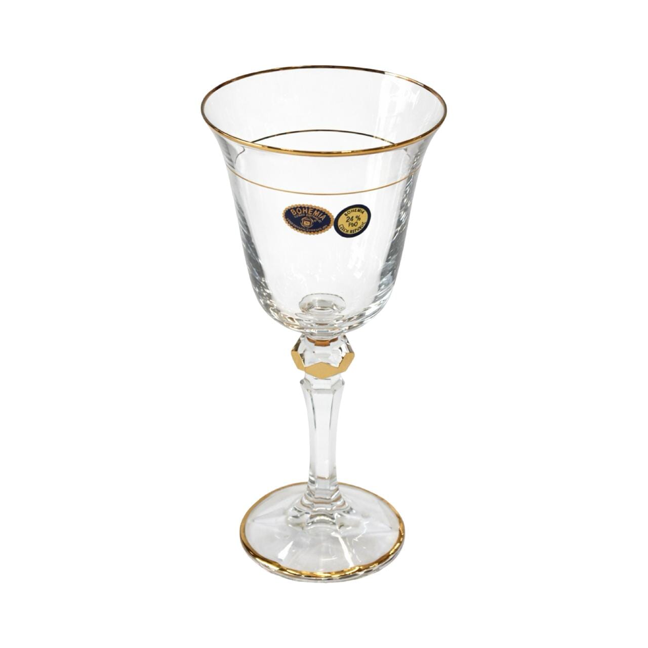 Clear glass with gold rim and base on a white background